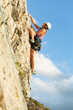 © prelevicm - Girls climbing a rock face and building confidence through women empowerment