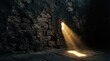 © Dara - A single, narrow window glows brightly within a dark, ancient stone wall.
