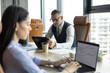 © be free - Busy businesspeople together. Coworking space. Successful entrepreneur collaborating on new project. Colleague work in modern business office with team vibe. Businesspeople working in office lobby