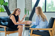 © Valerii Honcharuk - Professional female therapist counselor psychologist working with young woman patient