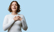 © Krakenimages.com - Woman casual smiling, hands on chest and hand over heart gesture, grateful face with closed eyes expressing health and gratitude, confident friendly pose on white background