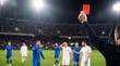 © Curioso.Photography - Football referee holding up a red card during a match in a packed stadium, while players react on the pitch under bright floodlights, illustrating sports discipline, fouls, penalties, and competitive
