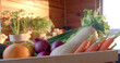 © WavebreakMediaMicro - Crate of fresh fruits and vegetables in sunny kitchen