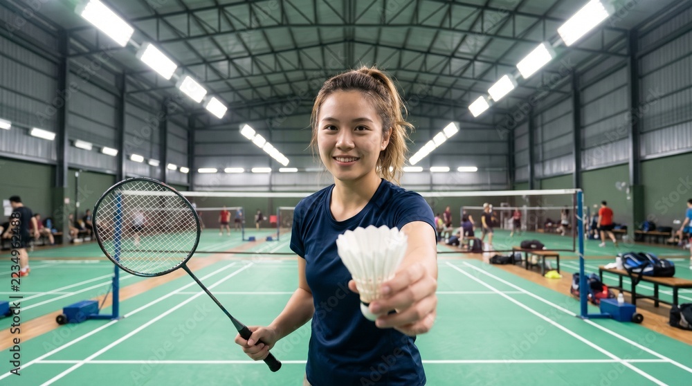 Interactive second person view at a badminton cour Friend holding ...