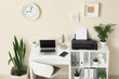 © Pixel-Shot - Remote work and home office setup, organized workspace with laptop and printer for freelance productivity and professional business environment