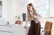 © Pixel-Shot - Heart attack and workplace stress, young woman suffering from chest pain and anxiety in office environment