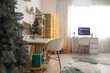 © Pixel-Shot - Interior of programmer's office with desks, Christmas tree and glowing lamp