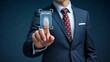 © picbox - A businessman in a suit interacts with a digital fingerprint interface surrounded by binary code