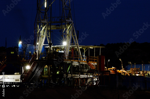 drilling rig at night