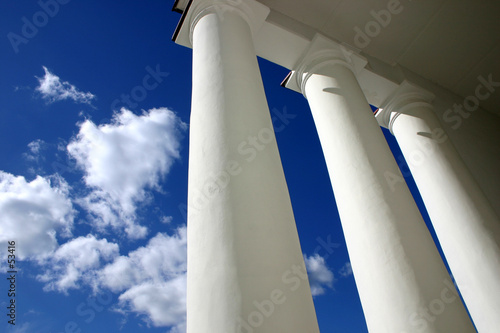 white columns in blue background of sky