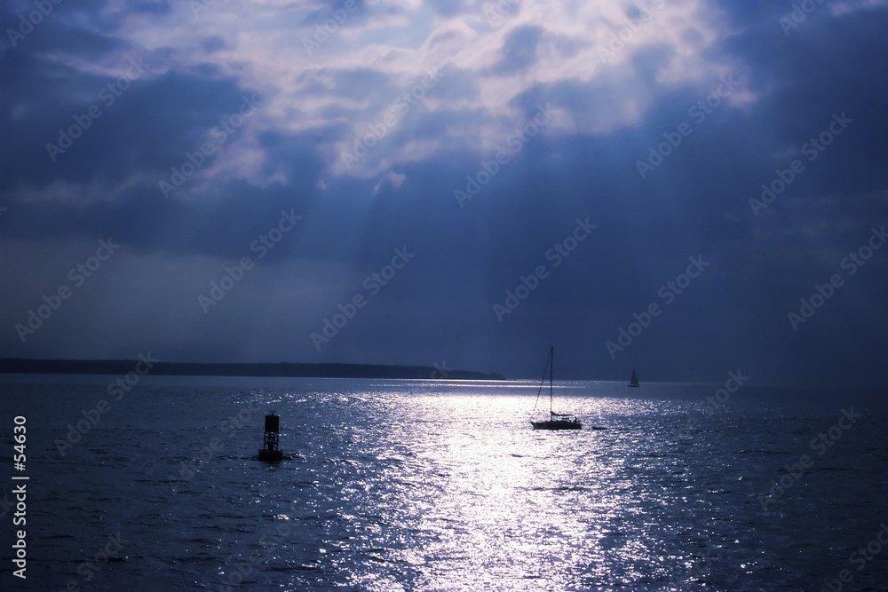 light rays over water