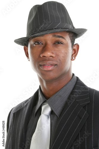 attractive young man in pinstripe suit and hat