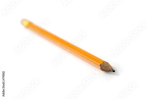 yellow pencil on white background