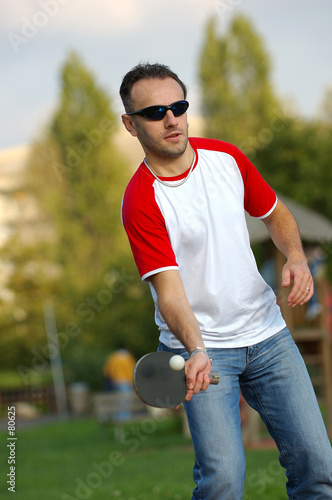 boy playing ping pong