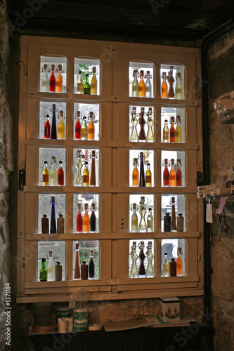 small bottles in store window © Marc Verdiesen