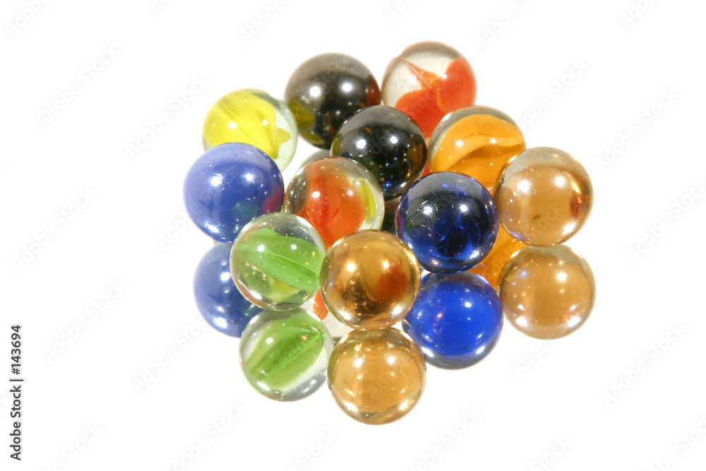 few marbles on mirror few marbles on mirror