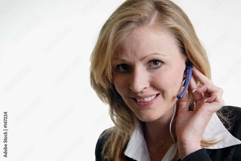 stock photo of pretty receptionist wearing headset stock photo of pretty receptionist wearing headset