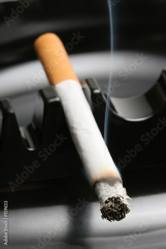 smoking cigarette in ashtray