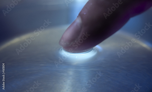 finger pressing light