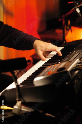 man playing keyboard