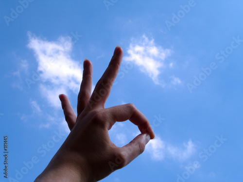 ok sign with cloud background