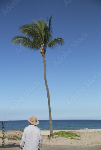 man on hawaiin beach