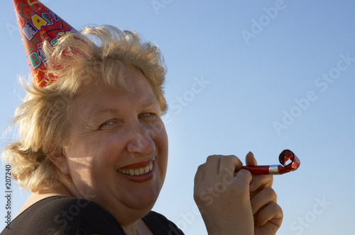 Obraz na plátně happy woman in birthday cap