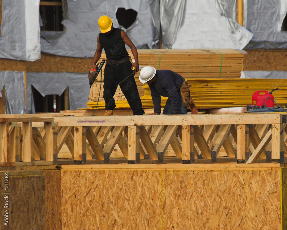 Photography 2 carpenters nailing