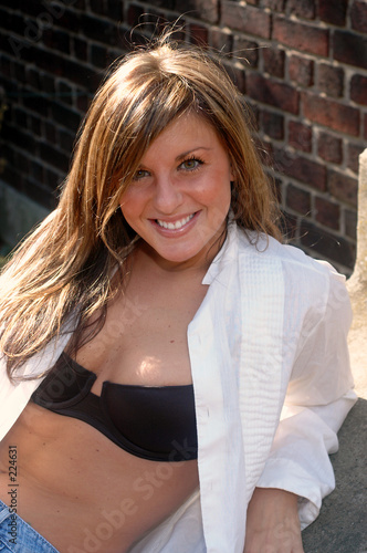 smiling brunette with open white shirt