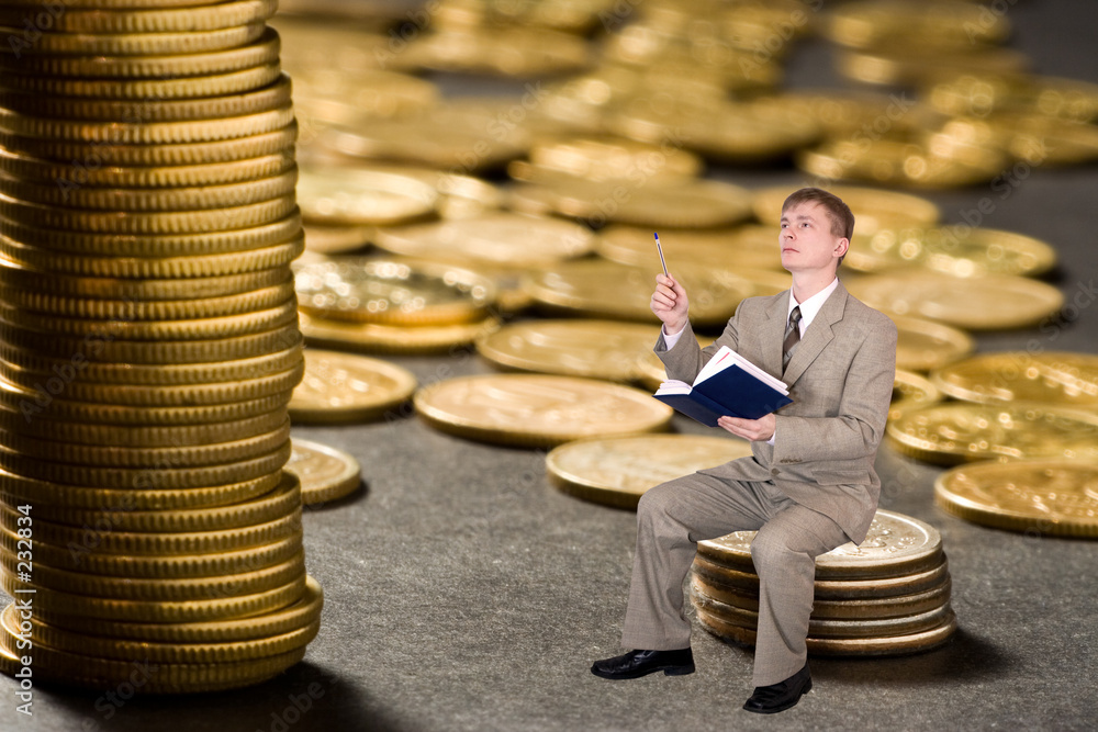 Fotografie young businessman count money