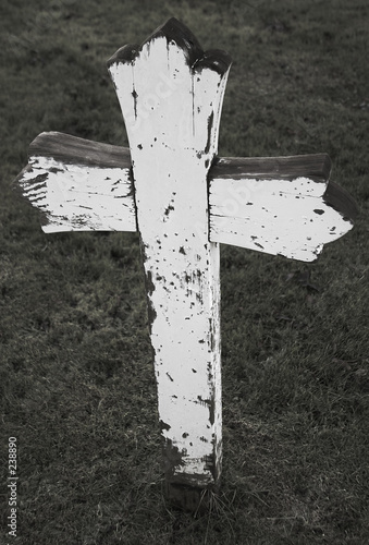 dilapidated wooden cross