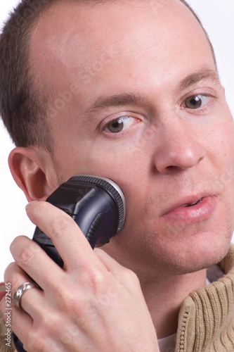 man shaving photo