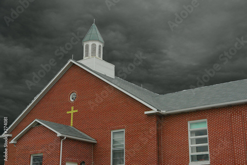 storm clouds over church