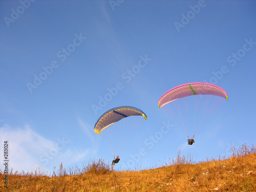 two paraglider