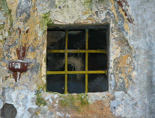 old barred window