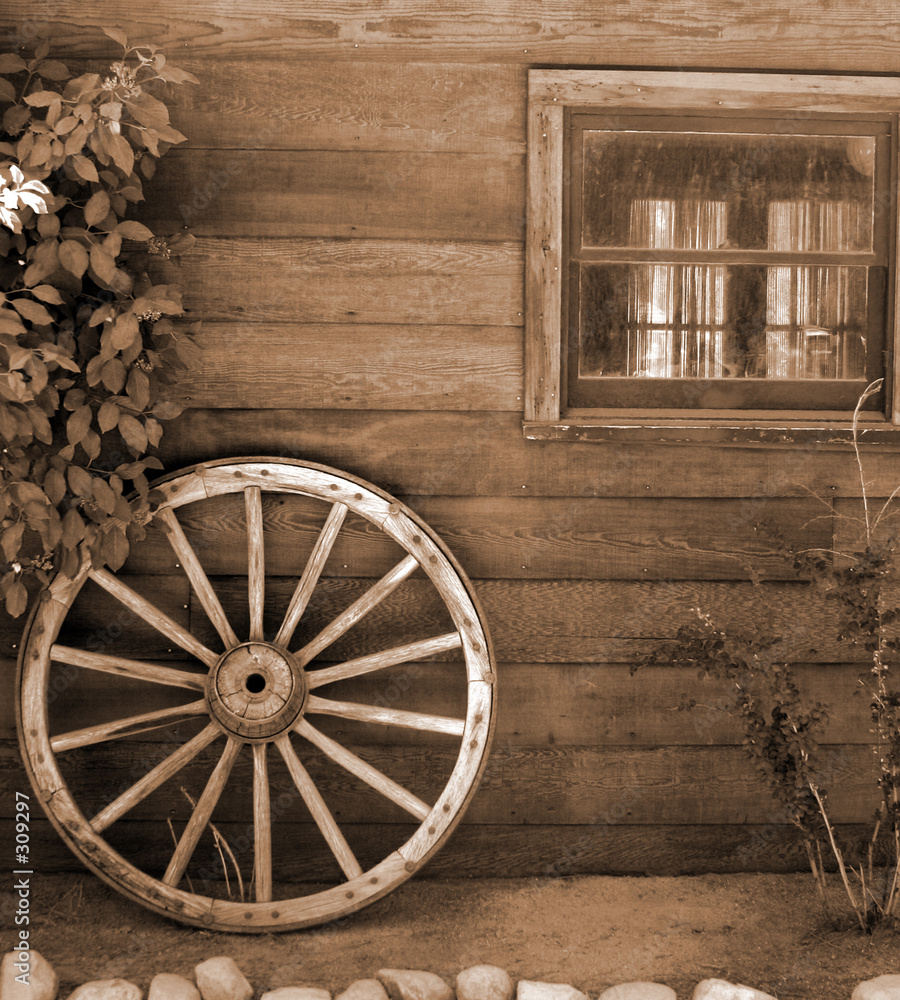 Fototapeta premium cabin and wagon wheel