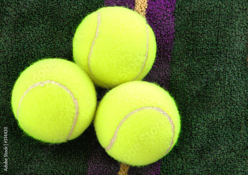 three tennis balls