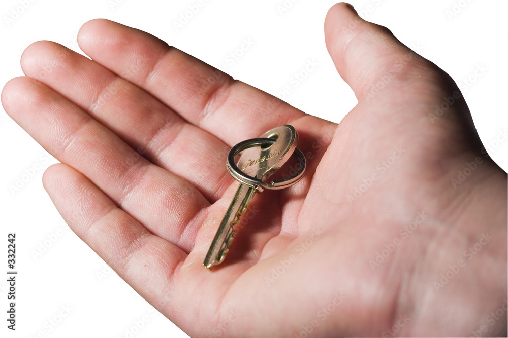hand holding keys (clipping path)