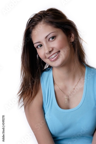 smiling young girl wearing braces
