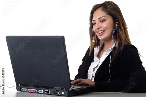 happy young receptionist wearing headset