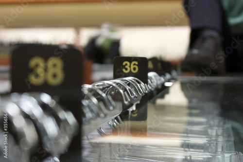 clothing racks with sizes 36 and 38 showing