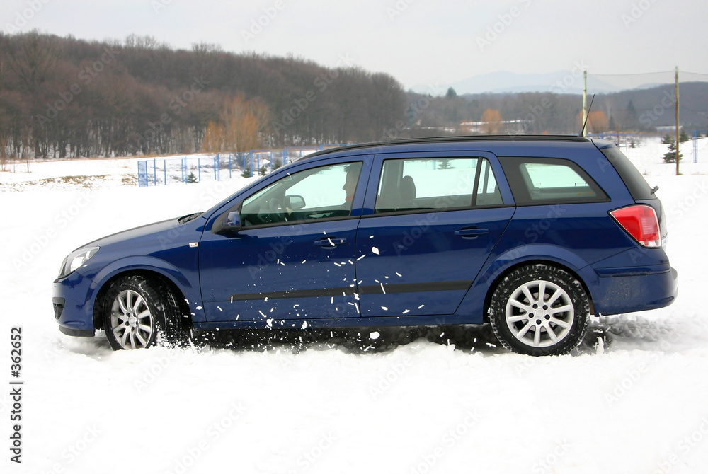 blue car on snow