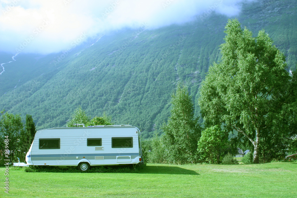 modern caravan at the campsite in the mountains - obrazy, fototapety, plakaty 