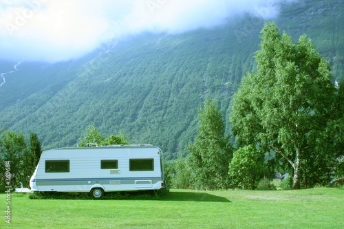 modern caravan at the campsite in the mountains