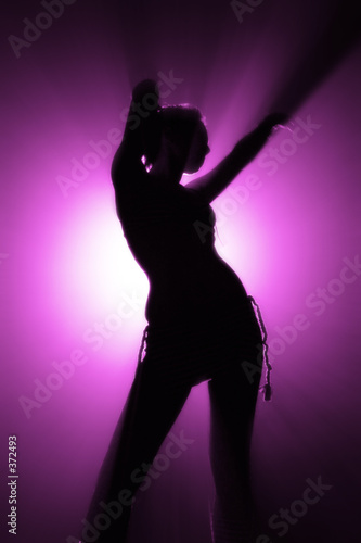 silhouette of disco dancer