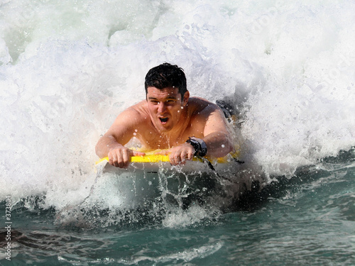 Εκτύπωση καμβά man boogie boarding at the beach