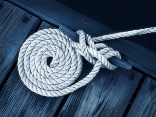 Fotobehang Zeilen Touw op houten zeilboot  © Joy Fera