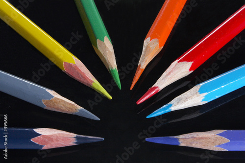 colored pencils on black