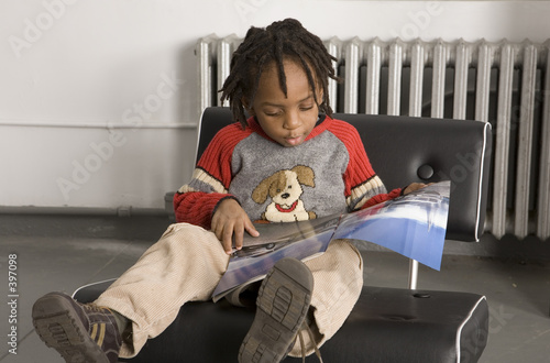 little boy reading