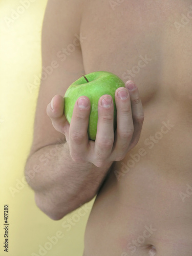 man hold apple